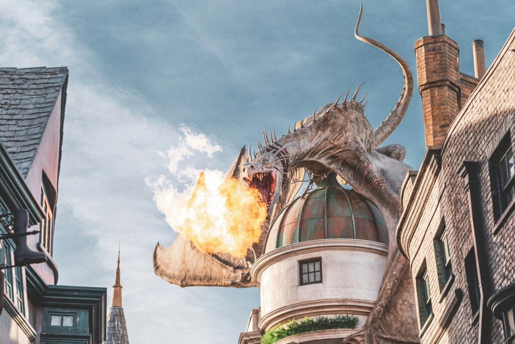 Dragon breathing fire on top of the Gringotts ride at Universal Studios.